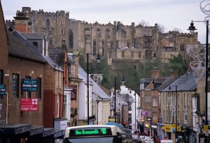 January 2012: A busy North Road, with the background of the iconic castle, shows a large variety of commercial activities and shops, most typically English. Most signs are readable, including Mason Owen, Knight Frank, Nobles Amusements, Tesco, Bradley Hall. A striking contrast between modern and ancient is presented here