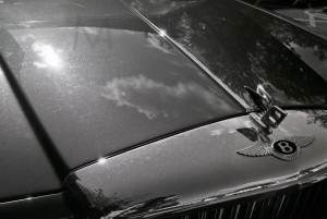 Durham, England - June 15, 2011: the bonnet of a Bentley parked in the outskirts of the city centre during a sunny day. Graduation ceremonies were going on at the University. Neopan 400
