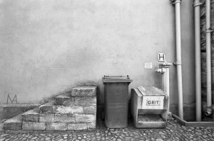 Grit (salt) container, hydrant attachment, rubbish bin, steps. Photographed in Durham, England. Kodak Professional Tri-X 400 [400TX] 