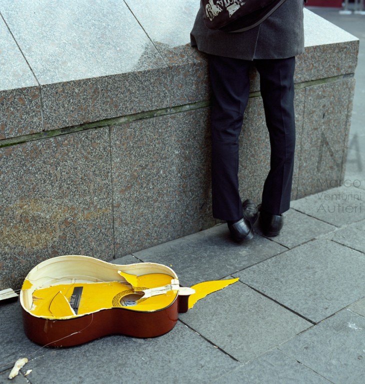 Somebody really lved this guitar. Photographed in Newcastle, England. Scan from 120 Portra 400