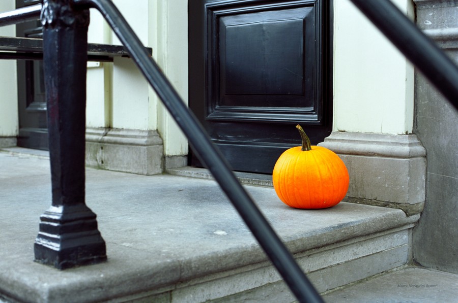 Pumpkin at the front door of a house in Amsterdam.