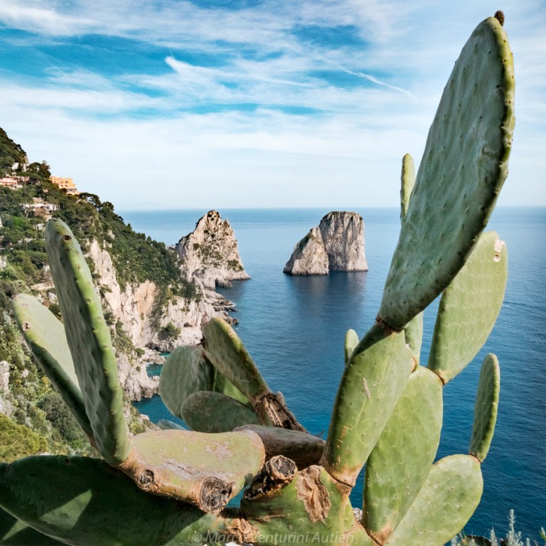The "Faraglioni" are a famous rocky formation, natural landmark of Capri, an island in the Bay of Naples. If you see this image, you immediately know where it was taken
